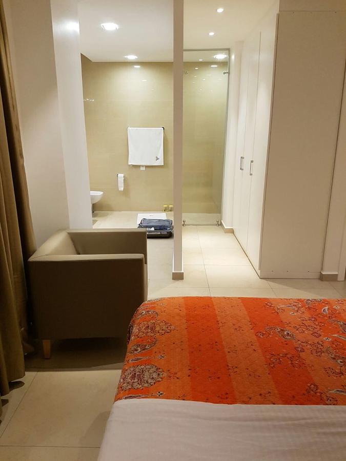 Suncity Hotel Apartment Accra Bagian luar foto